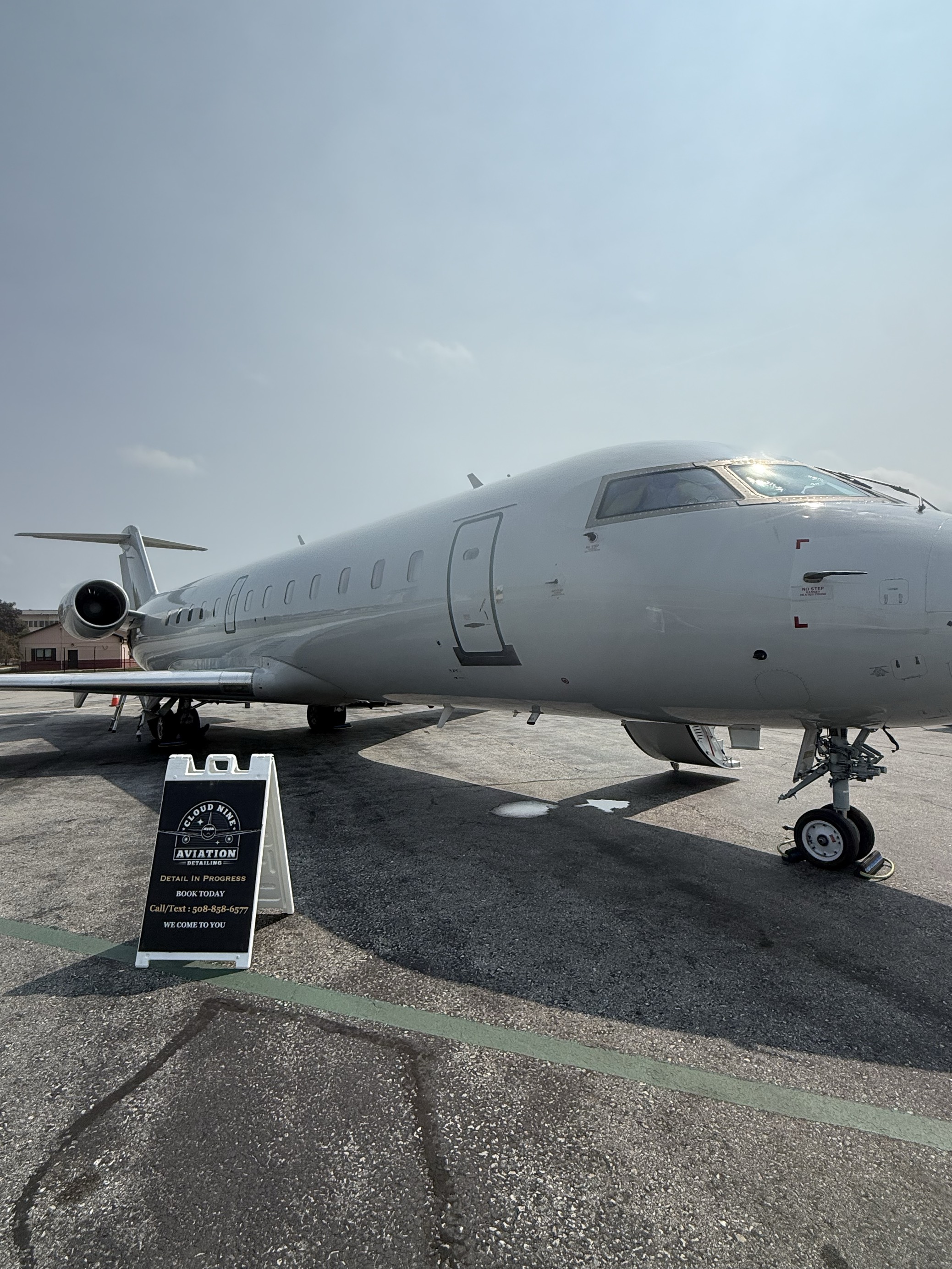 Aircraft receiving quick-turn cleaning on the ramp in Boston